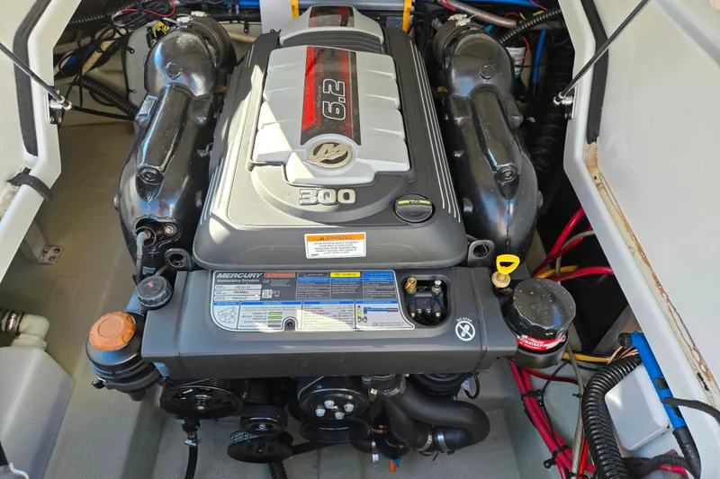 Slide: The Image of Engine compartment of a 2018 Crownline 275 SS boat with a Mercury 6.2L engine. - 26