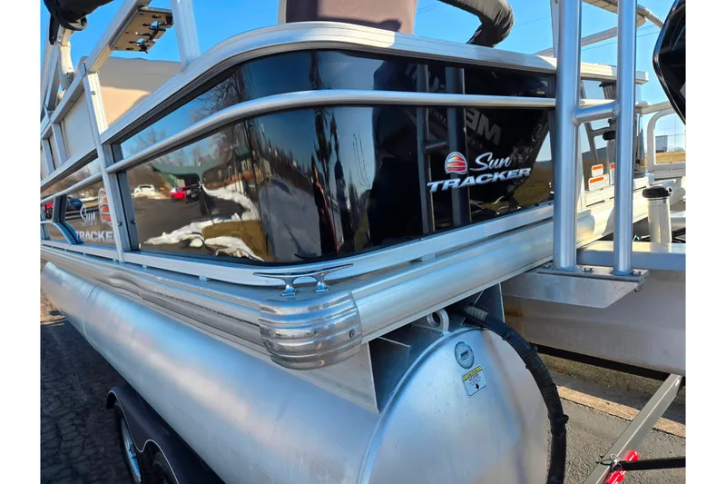 Slide: The Image of 2018 Sun Tracker Bass Buggy 18 DLX pontoon boat, side view with logo. - 4