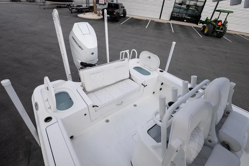 Slide: The Image of 2026 Blazer Bay Makaira 2800 boat interior with Mercury engine and seating arrangement. - 29