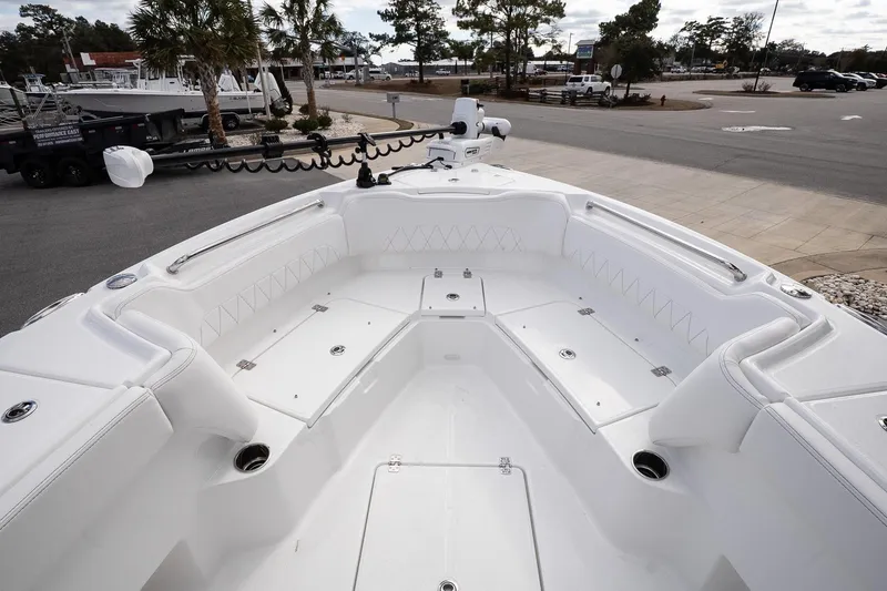 Slide: The Image of 2026 Blazer Bay Makaira 2800 boat interior with spacious seating and storage compartments. - 36