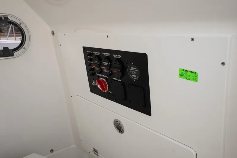 Slide: The Image of Control panel of 2026 Blazer Bay Makaira 2800 boat with switches and labels. - 42