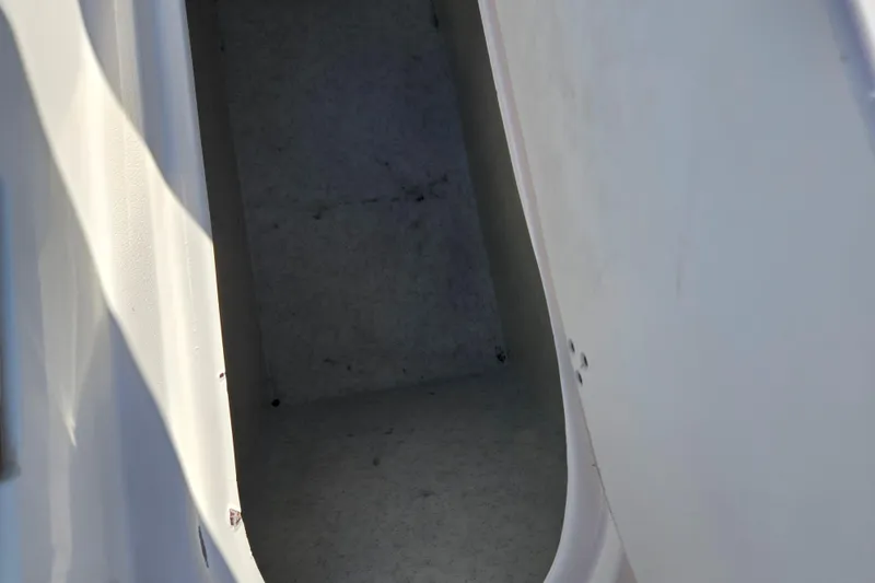 Slide: The Image of Storage compartment in 2007 Rinker 262 Captiva Cuddy boat. - 11