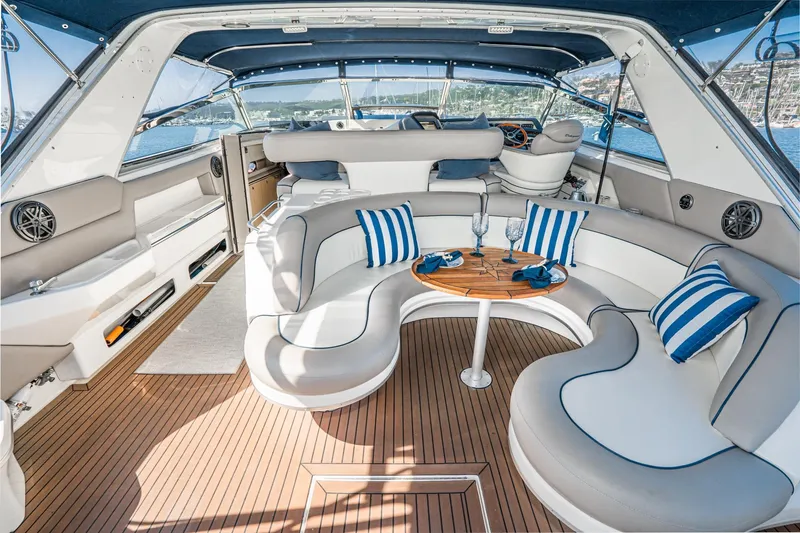 Slide: The Image of Luxurious 1999 Sea Ray 500 Sundancer yacht interior with elegant seating and nautical decor. - 12