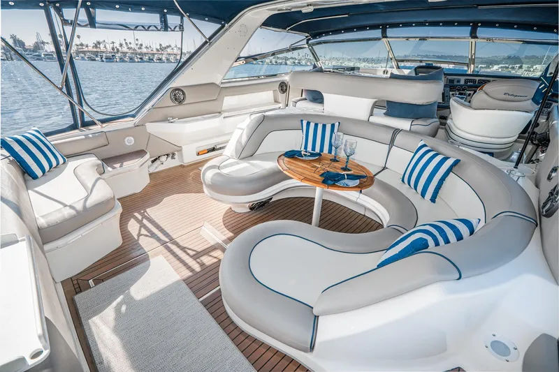 Slide: The Image of Luxurious 1999 Sea Ray 500 Sundancer yacht interior with elegant seating and nautical decor. - 15