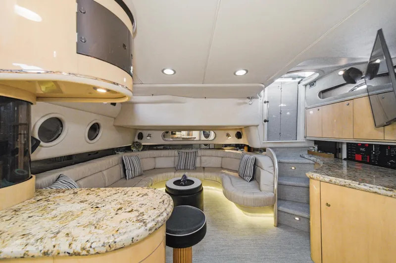 Slide: The Image of Luxurious 1999 Sea Ray 500 Sundancer yacht interior with plush seating and modern amenities. - 18