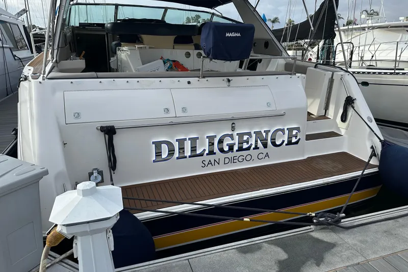 Slide: The Image of 1999 Sea Ray 500 Sundancer yacht named "Diligence" docked in San Diego, CA. - 2