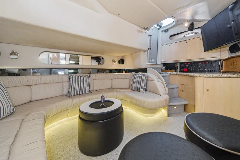 Slide: The Image of Luxurious interior of a 1999 Sea Ray 500 Sundancer yacht with plush seating and modern amenities. - 29