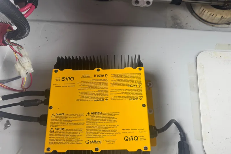Slide: The Image of Yellow QuiQ battery charger in a 2016 Duffy D-22 Bay Island boat. - 7