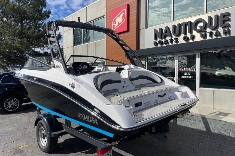 Slide: The Image of 2022 Yamaha Boats 195S displayed at Nautique Boats of Utah dealership. - 3