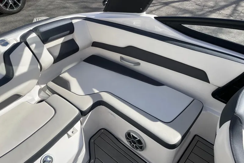 Slide: The Image of 2022 Yamaha Boats 195S interior seating with sleek design and comfortable upholstery. - 8