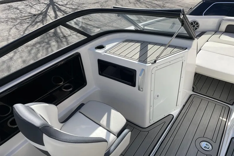 Slide: The Image of 2022 Yamaha Boats 195S interior with seating, storage, and sleek design elements. - 9