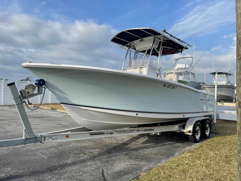 Slide: The Image of 2015 Sea Hunt Ultra 234 boat on trailer, side view. - 1