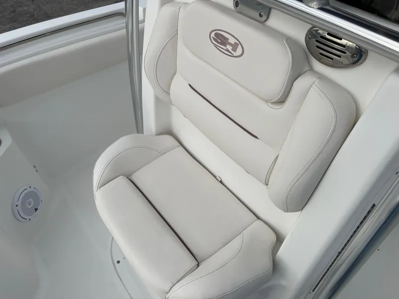 Slide: The Image of Seating area of a 2015 Sea Hunt Ultra 234 boat. - 11