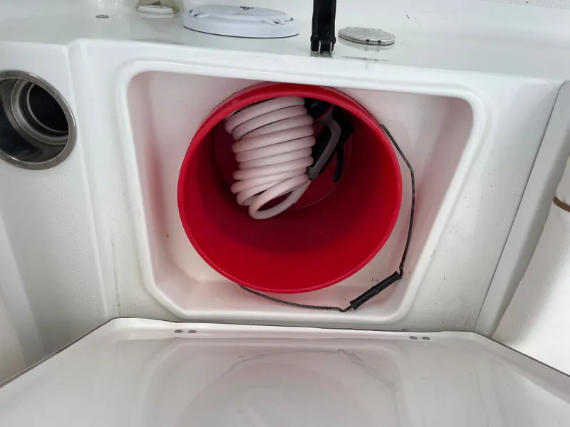 Slide: The Image of Red bucket with hose in 2015 Sea Hunt Ultra 234 boat. - 15