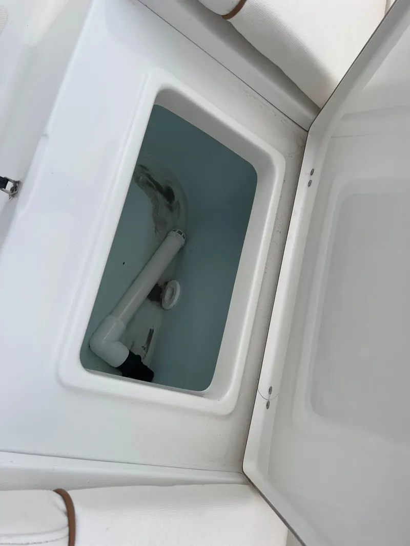 Slide: The Image of Storage compartment in 2015 Sea Hunt Ultra 234 boat. - 16
