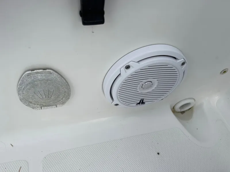 Slide: The Image of Speaker and cover on a 2015 Sea Hunt Ultra 234 boat. - 17