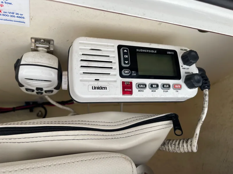 Slide: The Image of Uniden radio on Sea Hunt Ultra 234 boat, year 2015. - 24