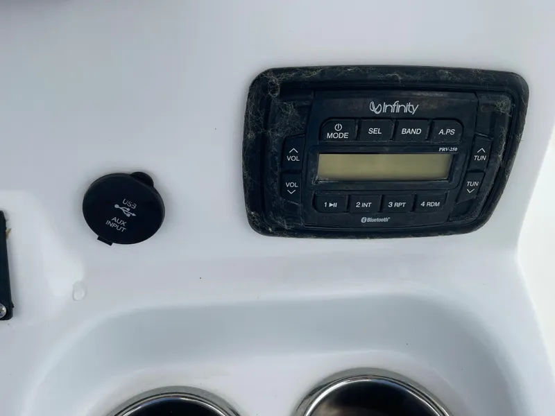 Slide: The Image of Infinity audio system on 2015 Sea Hunt Ultra 234 boat. - 26