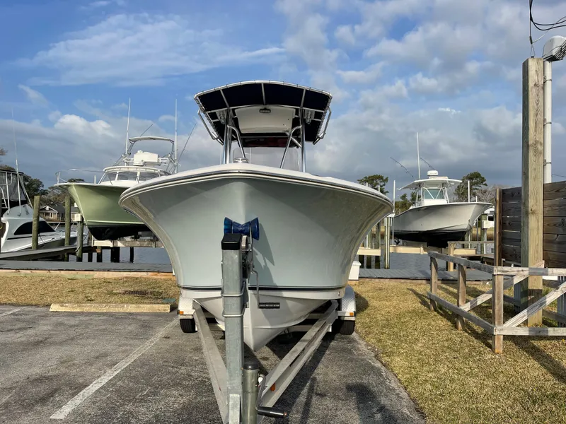 Slide: The Image of 2015 Sea Hunt Ultra 234 boat on trailer at marina. - 3