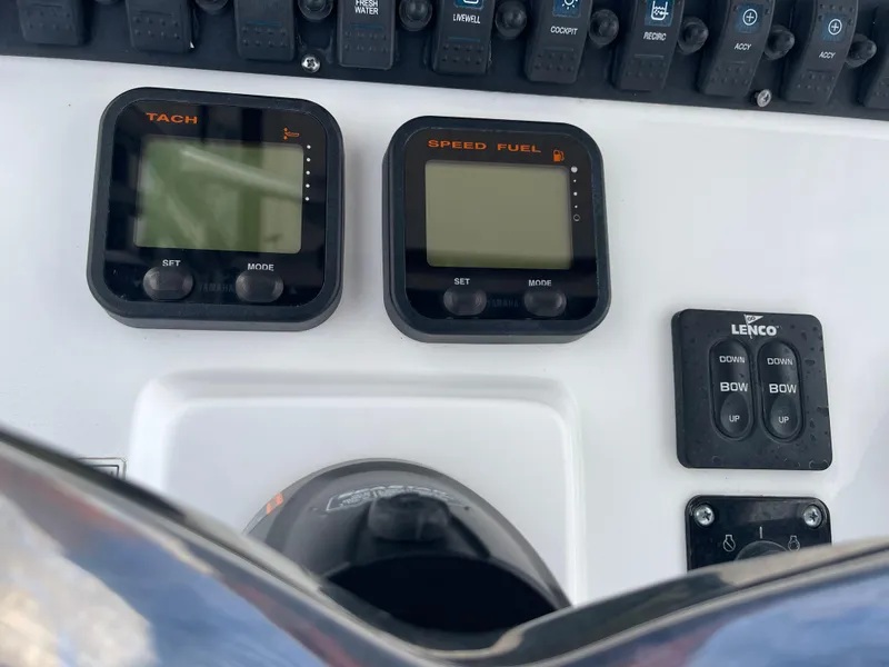 Slide: The Image of Dashboard of a 2015 Sea Hunt Ultra 234 boat. - 30