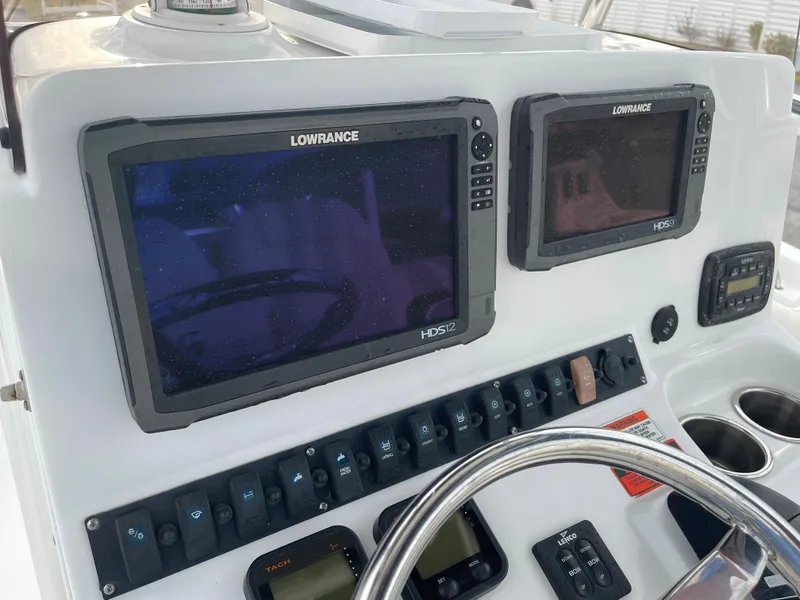 Slide: The Image of Dashboard of a Sea Hunt Ultra 234 boat with Lowrance electronics. - 31