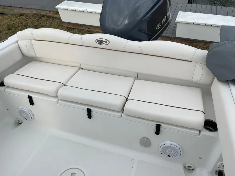 Slide: The Image of Rear seating of a 2015 Sea Hunt Ultra 234 boat. - 32