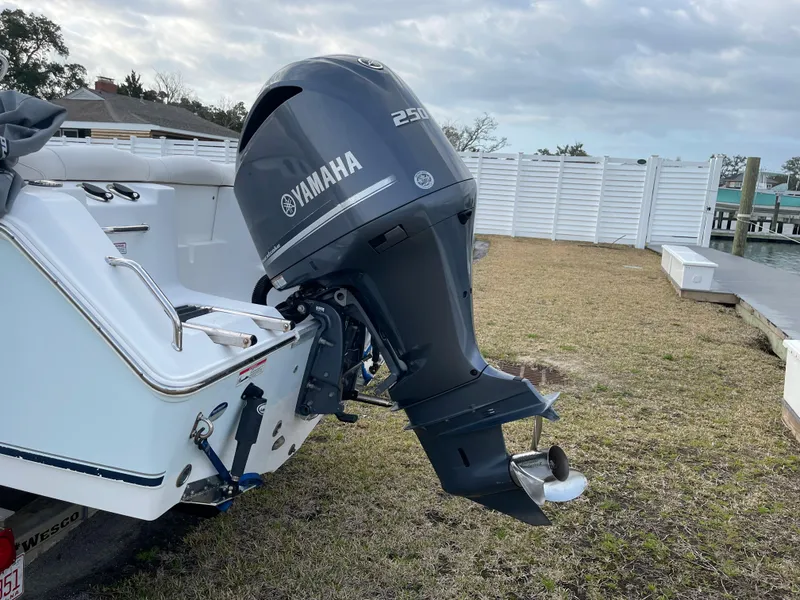 Slide: The Image of Yamaha 250 HP outboard motor on a Sea Hunt Ultra 234 boat. - 8