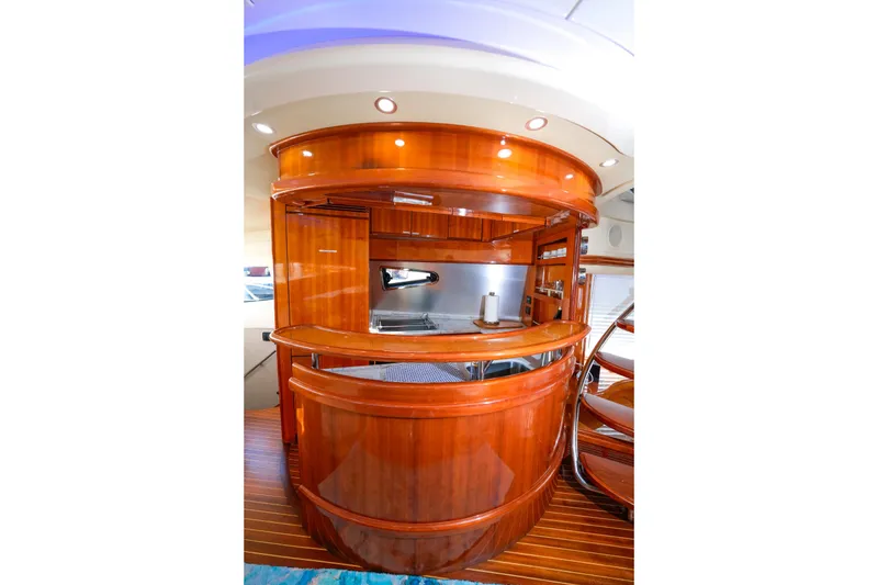 Slide: The Image of Luxurious wooden interior of 2007 Azimut 68E yacht kitchen area. - 14