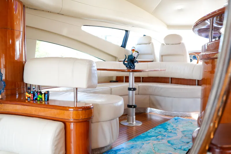 Slide: The Image of Luxurious interior of 2007 Azimut 68E yacht with elegant seating and decor. - 17