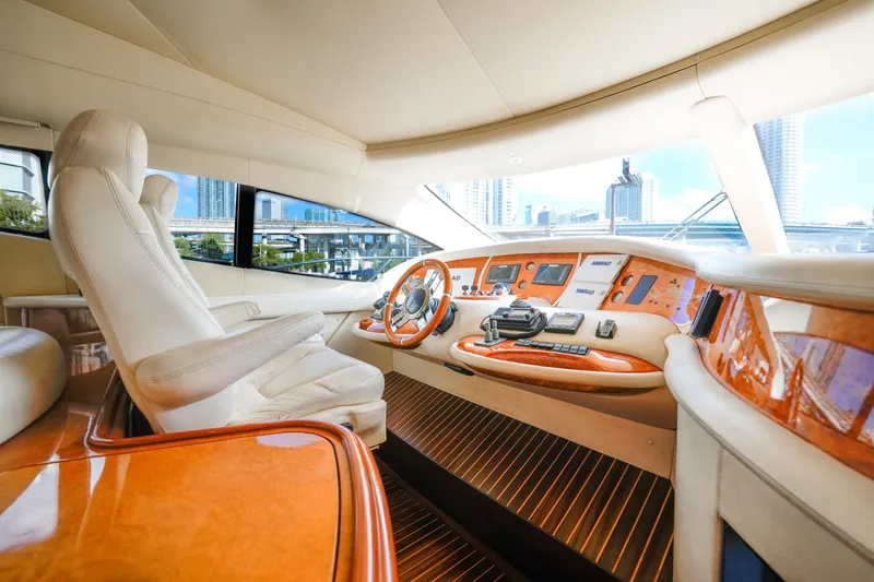 Slide: The Image of Luxurious interior of 2007 Azimut 68E yacht with elegant wood and leather finishes. - 22