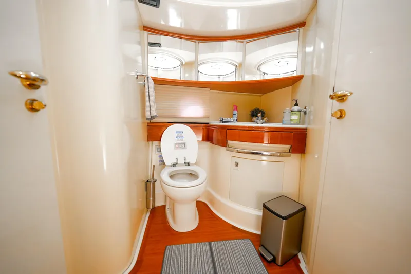 Slide: The Image of Luxurious bathroom in 2007 Azimut 68E yacht with modern amenities and elegant design. - 27