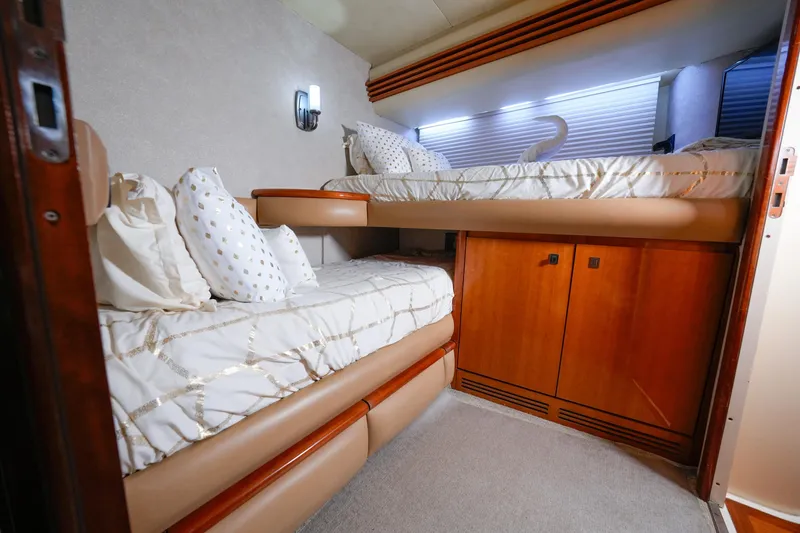 Slide: The Image of Luxurious cabin interior of 2007 Azimut 68E yacht with cozy bunk beds. - 28