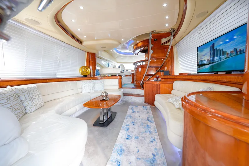 Slide: The Image of Luxurious interior of 2007 Azimut 68E yacht with elegant seating and modern decor. - 4