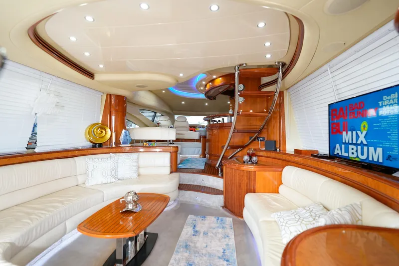 Slide: The Image of Luxurious interior of a 2007 Azimut 68E yacht with elegant seating and modern decor. - 5