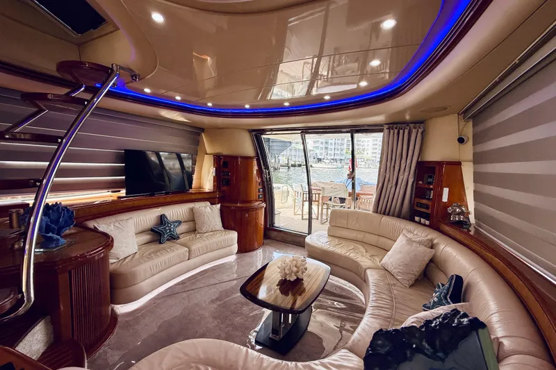 Slide: The Image of Luxurious bedroom interior of 2007 Azimut 68E yacht with elegant decor and plush bedding. - 50