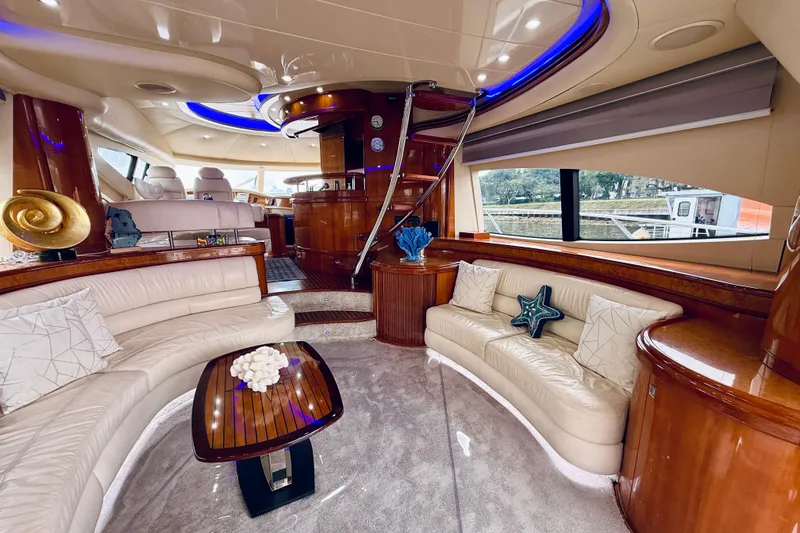 Slide: The Image of Luxurious 2007 Azimut 68E yacht deck with ocean view and American flag. - 59