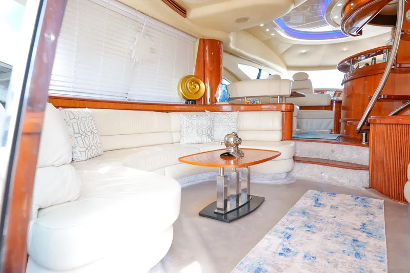 Slide: The Image of Luxurious interior of a 2007 Azimut 68E yacht with elegant seating and modern decor. - 6