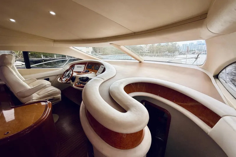 Slide: The Image of Luxurious 2007 Azimut 68E yacht deck with elegant seating and ocean view. - 62