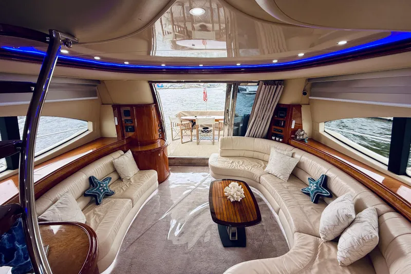 Slide: The Image of 2007 Azimut 68E yacht with city skyline in the background. - 66