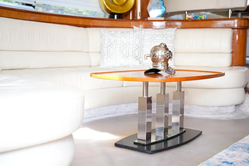 Slide: The Image of Luxurious interior of 2007 Azimut 68E yacht with modern table and decor. - 7