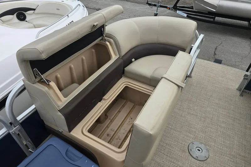 Slide: The Image of 2019 Sun Tracker Party Barge 22 Sport Fish with open storage compartment on deck. - 11