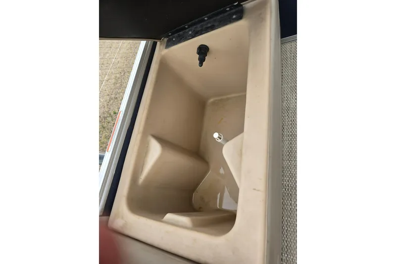 Slide: The Image of Livewell compartment on 2019 Sun Tracker Party Barge 22 Sport Fish pontoon boat. - 12