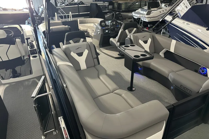 Slide: The Image of Evotti 523QL 2026 boat with ladder and motor in a garage setting. - 13