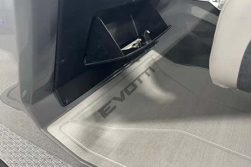 Slide: The Image of Interior of 2026 Evotti 523QL showcasing branded floor mat and sleek design. - 5
