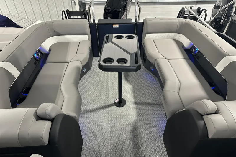Slide: The Image of Luxurious interior of 2026 Evotti 523QL boat with plush seating and central table. - 6