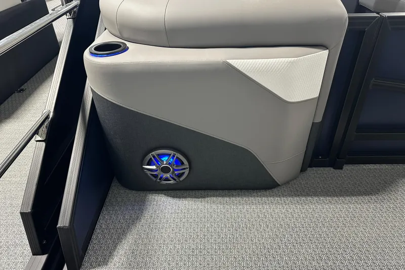 Slide: The Image of Luxury seating with cup holder and speaker in 2026 Evotti 523QL boat. - 9