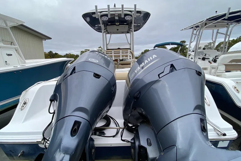 Slide: The Image of 2015 Sportsman Heritage 251 Center Console with dual Yamaha outboard engines. - 3