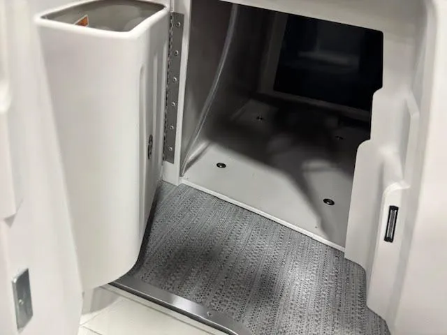 Slide: The Image of Interior of 2026 Godfrey SW2286SBC with storage compartment. - 17