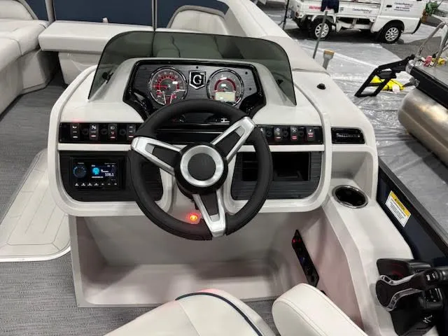 Slide: The Image of Control console of Godfrey SW2286SBC pontoon boat, year 2026. - 18