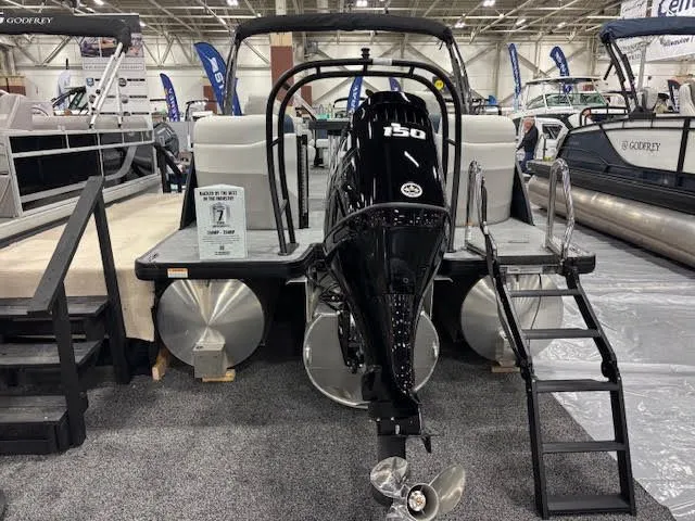 Slide: The Image of Godfrey SW2286SBC 2026 pontoon boat with outboard motor at exhibition. - 4